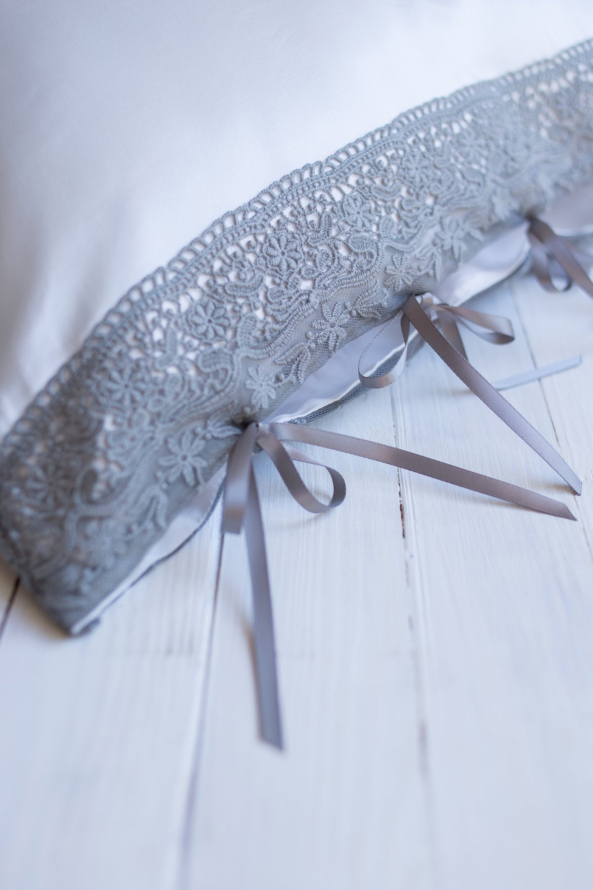 natural white silk pillowcase edged in grey lace and ribbon